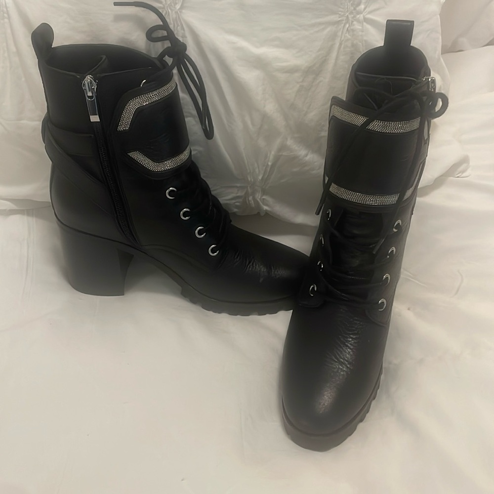 Super cute biker hoot by Paige. Runs a little large so could fit an 8.